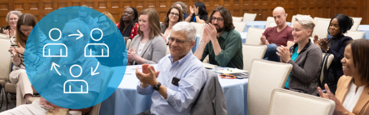 Photo of audience members clapping at a conference for Civic Engagement Fellows
