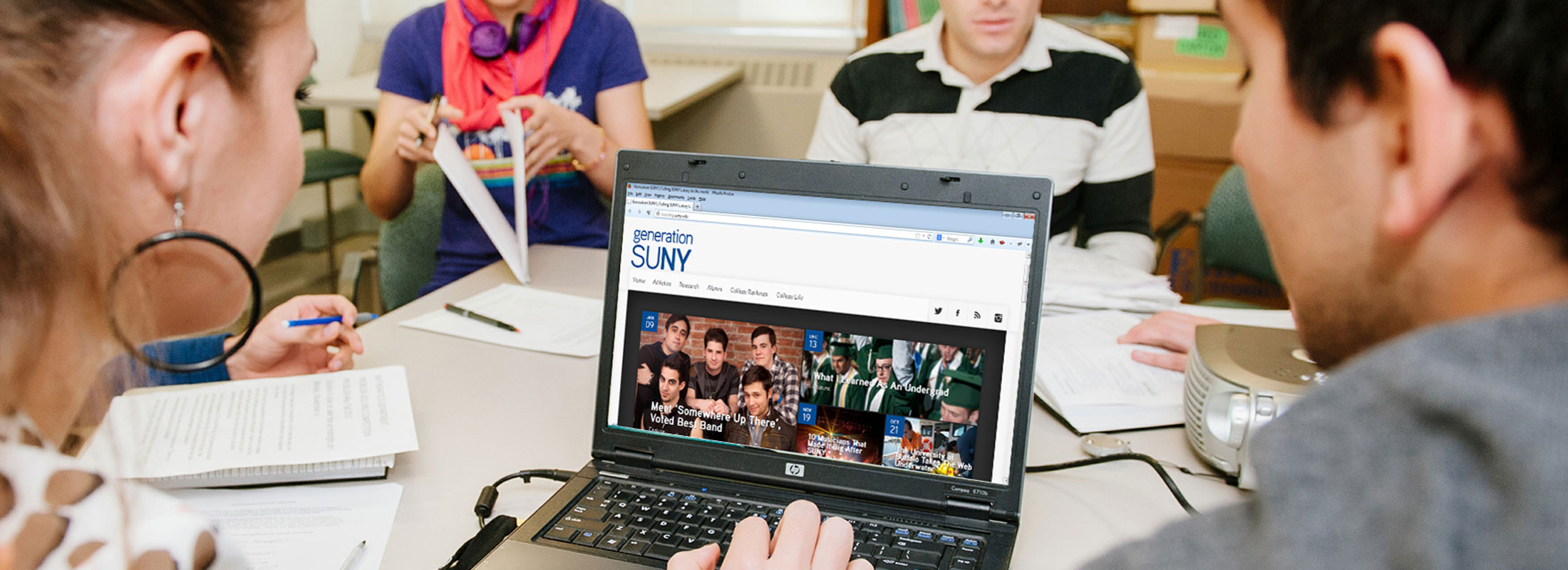 social media banner with students looking at laptop screen with Generation SUNY blog home page